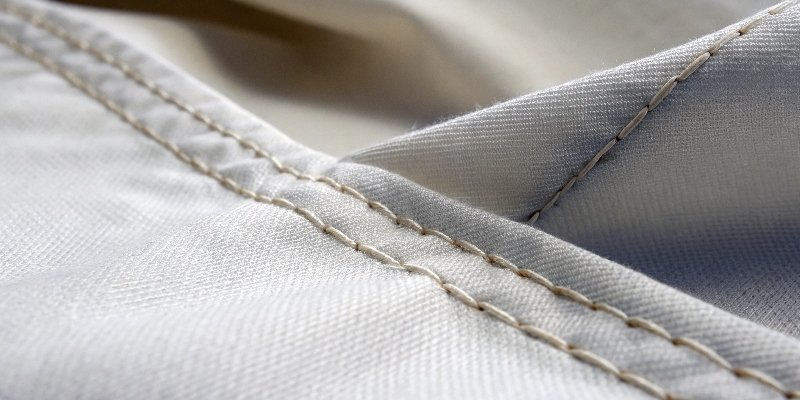 A close-up of a seam showing slight puckering from incorrect tension